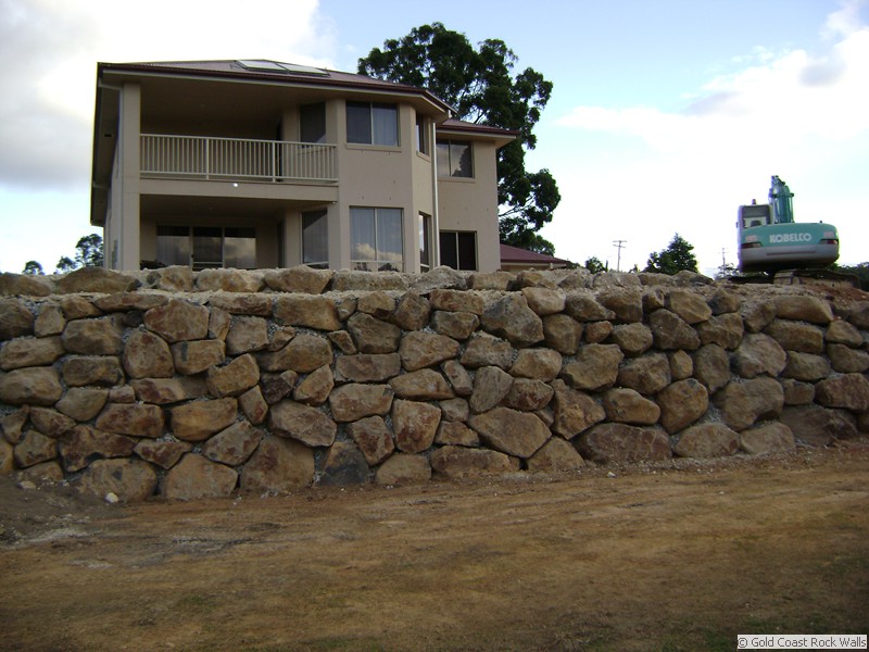Boulder wall construction
