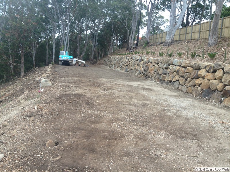 Rock boulder wall constructions